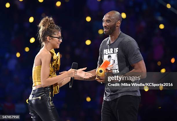 Actress Zendaya presents the Legend award to honoree Kobe Bryant onstage during the Nickelodeon Kids' Choice Sports Awards 2016 at UCLA's Pauley...