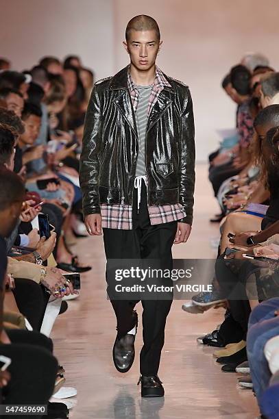 Model walks the runway at the Ovadia & Sons fashion show during New York Fashion Week: Men's S/S 2017 on July 12, 2016 in New York City.