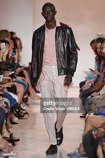 Model walks the runway at the Ovadia & Sons fashion show during New York Fashion Week: Men's S/S 2017 on July 12, 2016 in New York City.