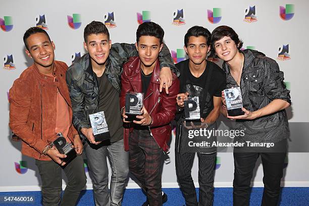 Singers Zabdiel de Jesus, Richard Camacho, Erick Brian Colon, Joel Pimentel and Christopher Velez of CNCO pose with awards at the Univision's 13th...