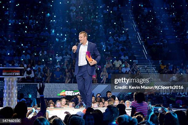 Player Rob Gronkowski accepts an award onstage during the Nickelodeon Kids' Choice Sports Awards 2016 at UCLA's Pauley Pavilion on July 14, 2016 in...