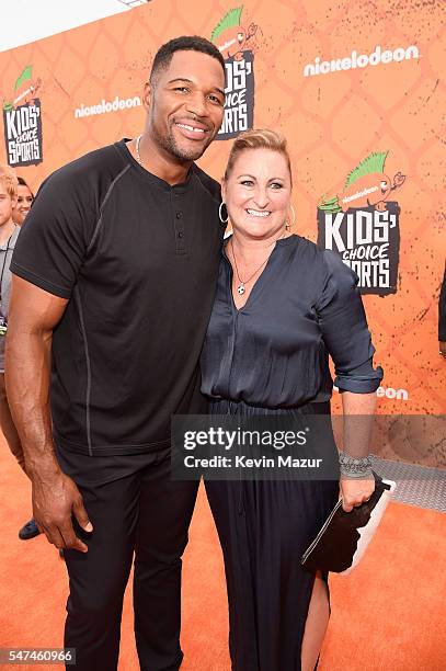 Personality/retired NFL player Michael Strahan and President of Nickelodeon Cyma Zarghami attend the Nickelodeon Kids' Choice Sports Awards 2016 at...