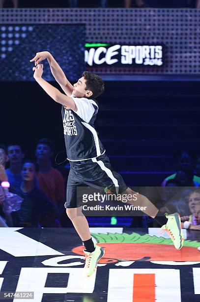 Triple Shot Challenge contestant Rey Fernandez participates in a contest onstage during the Nickelodeon Kids' Choice Sports Awards 2016 at UCLA's...