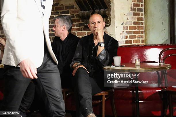 John Varvatos watches models rehearse before the John Varvatos Spring/Summer 2017 Fashion Show at The Django at Roxy Hotel on July 14, 2016 in New...
