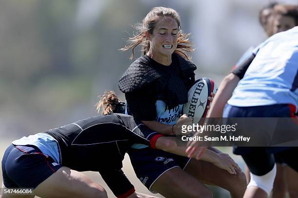 Rugby hopeful Ryan Carlyle runs with the ball during a training session at the Olympic Training Center on July 14, 2016 in Chula Vista, California.