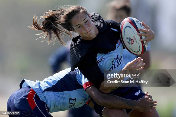 Rugby hopeful Ryan Carlyle runs with the ball during a training session at the Olympic Training Center on July 14, 2016 in Chula Vista, California.