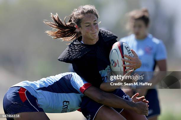 Rugby hopeful Ryan Carlyle runs with the ball during a training session at the Olympic Training Center on July 14, 2016 in Chula Vista, California.