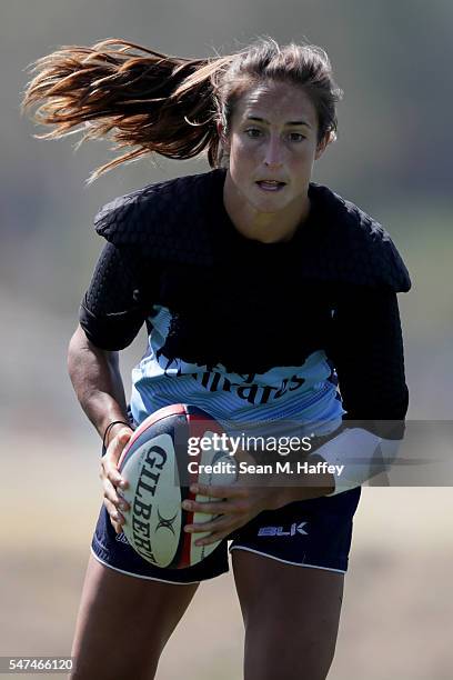 Rugby hopeful Ryan Carlyle runs with the ball during a training session at the Olympic Training Center on July 14, 2016 in Chula Vista, California.