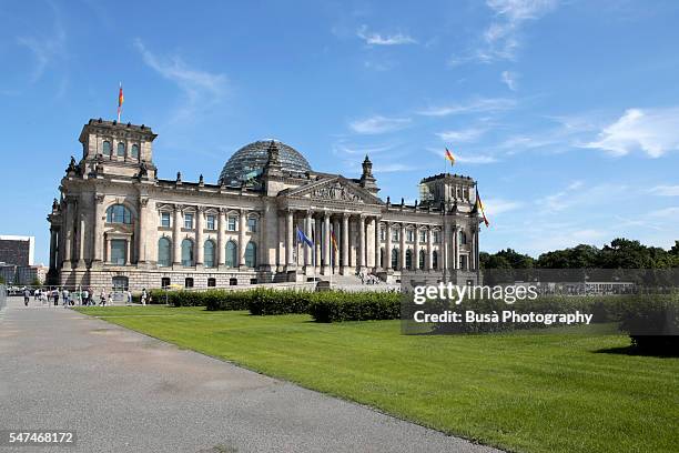 view of the german bundestag (deutscher bundestag), the german parliament, in the former reichstag building in berlin, germany - bundestag stockfoto's en -beelden