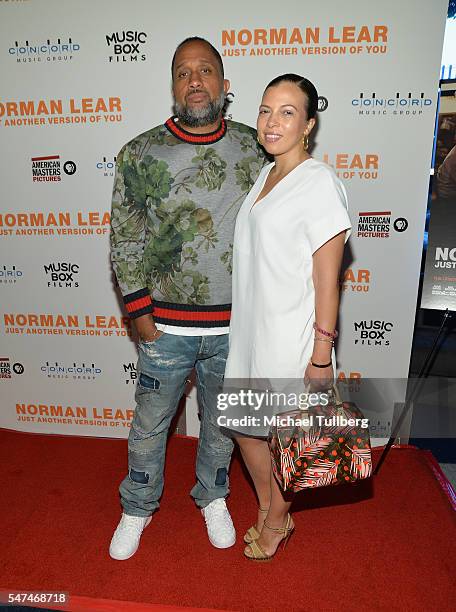 Writer Kenya Barris and Dr. Rainbow Edwards-Barris attend the premiere of Music Box Films' "Norman Lear: Just Another Version Of You" at The WGA...