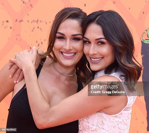 Professional wrestlers Nikki Bella and Brie Bella arrive at Nickelodeon Kids' Choice Sports Awards 2016 at UCLA's Pauley Pavilion on July 14, 2016 in...
