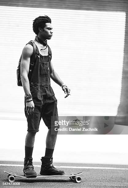 Model is seen outside the Parke & Ronen show wearing black overalls during New York Fashion Week: Men's S/S 2017 - Day 4 on July 14, 2016 in New York...