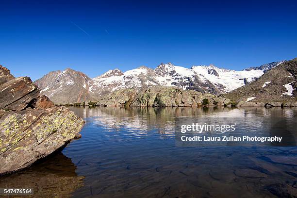 mountain lake - laura zulian stock pictures, royalty-free photos & images