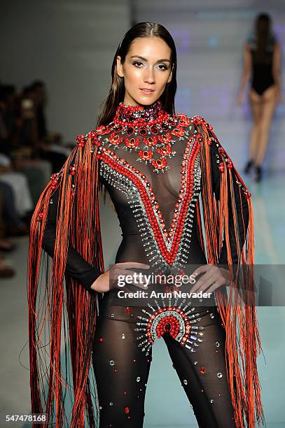 Model walks the runway at Rocky Gathercole Runway Show during Art Hearts Fashion Miami Swim Week Presented by AIDS Healthcare Foundation at Collins...