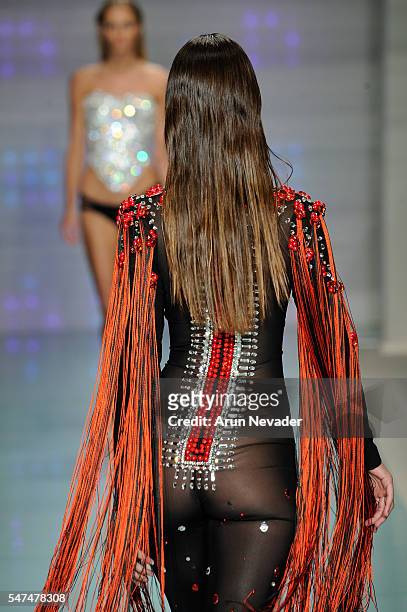 Model walks the runway at Rocky Gathercole Runway Show during Art Hearts Fashion Miami Swim Week Presented by AIDS Healthcare Foundation at Collins...
