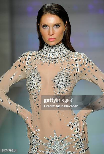 Model walks the runway at Rocky Gathercole Runway Show during Art Hearts Fashion Miami Swim Week Presented by AIDS Healthcare Foundation at Collins...