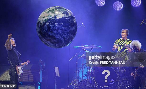 Les Insus' band, Jean-Louis Aubert , Richard Kolinka and Louis Bertignac perform on July 14, 2016 in Carhaix-Plouguer, western of France during the...