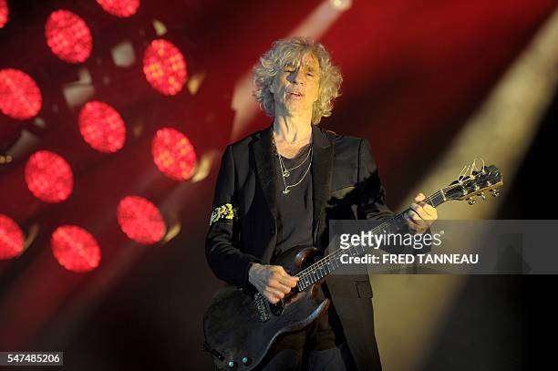 Les Insus' guitarist Louis Bertignac performs July 14, 2016 in Carhaix-Plouguer, western of France during the first day of the 25th edition of the...