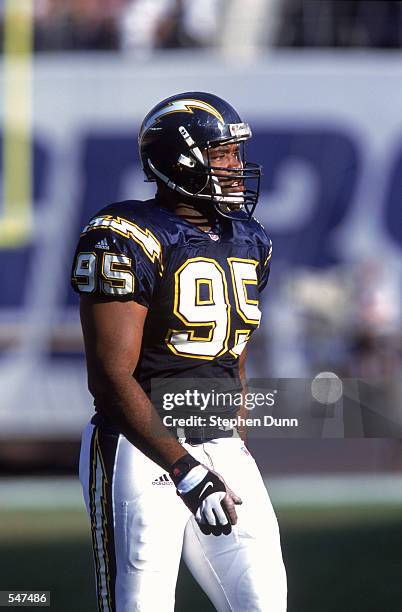 Defensive end Al Fontenot of the San Diego Chargers stands on the field during the NFL game against the Kansas City Chiefs at Qualcomm Stadium in San...