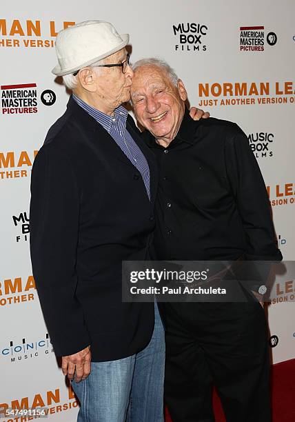 Producers Norman Lear and Mel Brooks attend the premiere of "Norman Lear: Just Another Version Of You" at The WGA Theater on July 14, 2016 in Beverly...