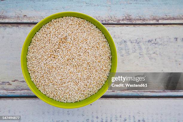 popped organic amarant in bowl - amarant stock pictures, royalty-free photos & images