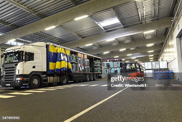 Unloading Semis 2,342 Unloading Semi Stock Photos, High-Res Pictures, and Images ...