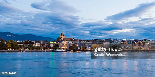 switzerland, geneva, cityscape with saint-pierre cathedral at lake geneva - st pierre cathedral geneva stock pictures, royalty-free photos & images
