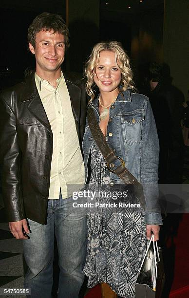 Actress Jessica Napier and an unidentified guest attend the red carpet premiere of "Little Fish" at the Dendy Opera Quays on September 5, 2005 in...
