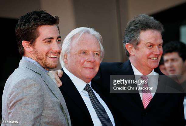 Actor Jake Gyllenhaal , Sir Anthony Hopkins and John Madden arrive for the premiere for the film 'Proof' at the Palazzo del Cinema on the sixth day...