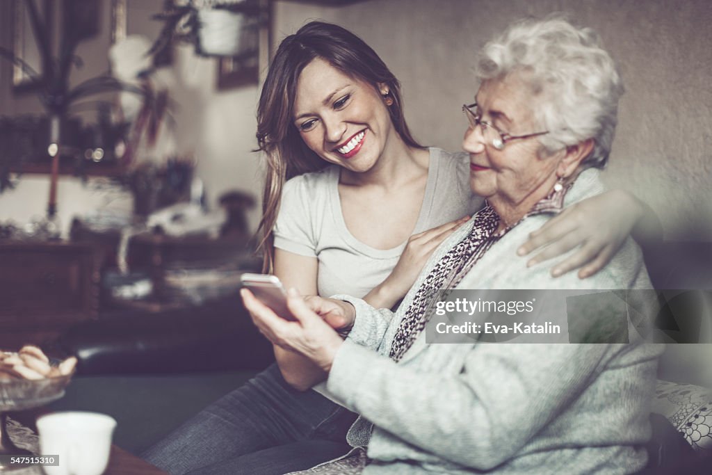 Social worker is visiting a senior woman