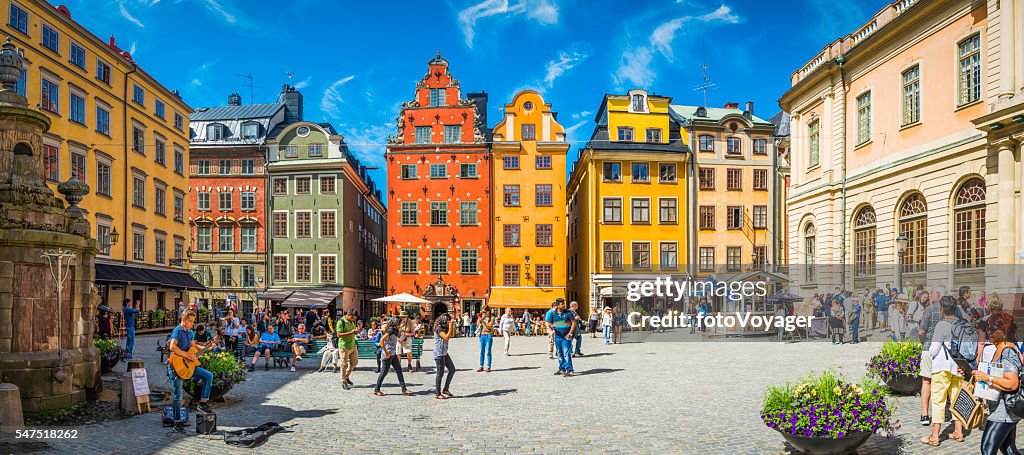 Stockholm Stortorget tourists in medieval square colourful houses restaurants Sweden