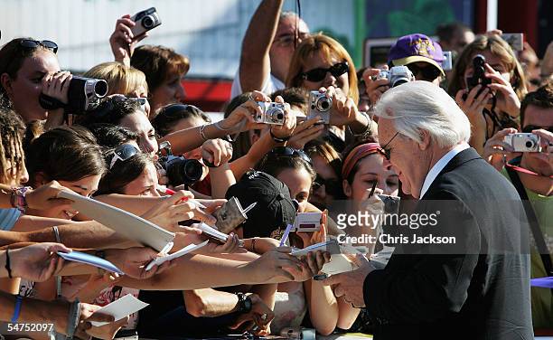 Actor Sir Anthony Hopkins greets the crowds as he arrives for the premiere for the film 'Proof' at the Palazzo del Cinema on the sixth day of the...