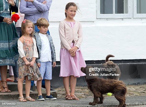 Princess Josephine and Prince Vincent of Denmark, and Princess Isabella of Denmark, attend the annual summer photo call for The Danish Royal Family...