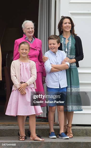 Queen Margrethe of Denmark, and Crown Princess Mary of Denmark, and Prince Christian, Princess Isabella of Denmark, attend the annual summer photo...