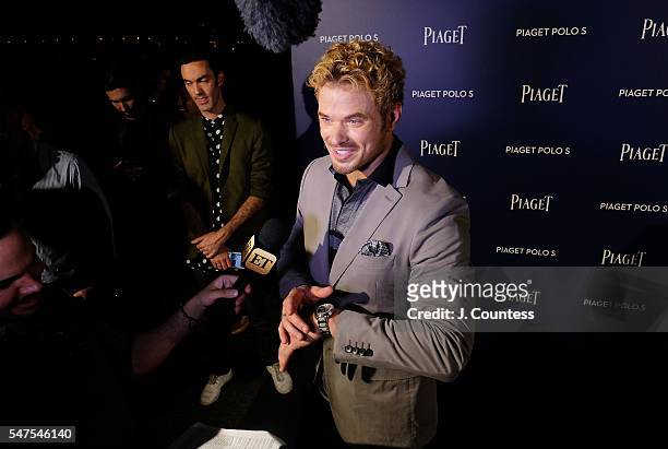Actor Kellan Lutz speaks to the media at the Piaget New Timepiece Launch at the Duggal Greenhouse on July 14, 2016 in New York City.