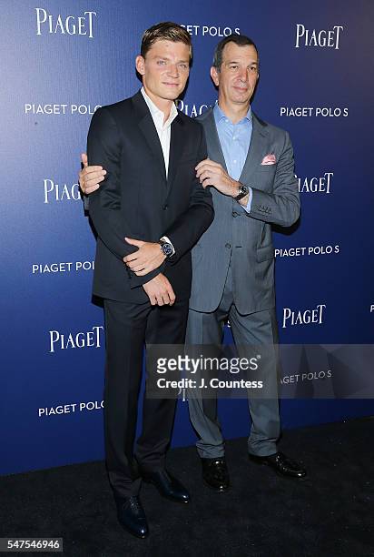 David Goffin and CEO of Piaget Philippe Lopold-Metzger attend the Piaget New Timepiece Launch at the Duggal Greenhouse on July 14, 2016 in New York...