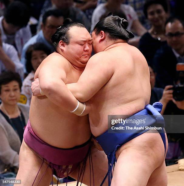 Takarafuji and Shodai compete in their bout during day six of the Grand Sumo Nagoya Tournament at the Aichi Prefecture Gymnasium on July 15, 2016 in...