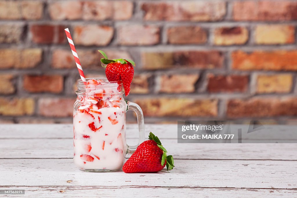 Mason jar of strawberry and yogurt