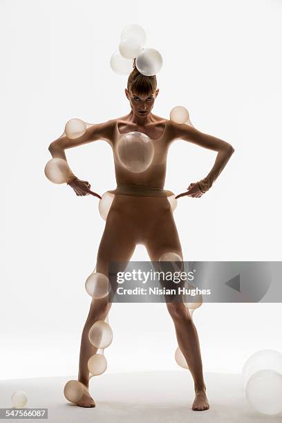 woman with balloons in body suit - chirurgia estetica donna foto e immagini stock
