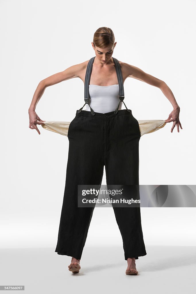 Woman with empty pockets