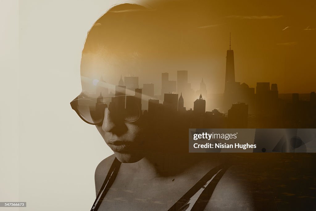 Double exposure portrait of woman