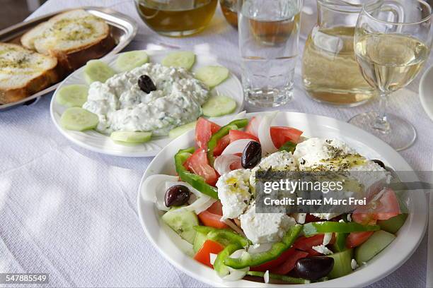 choriadiki, a greek salad with feta cheese - griekse gerechten stockfoto's en -beelden