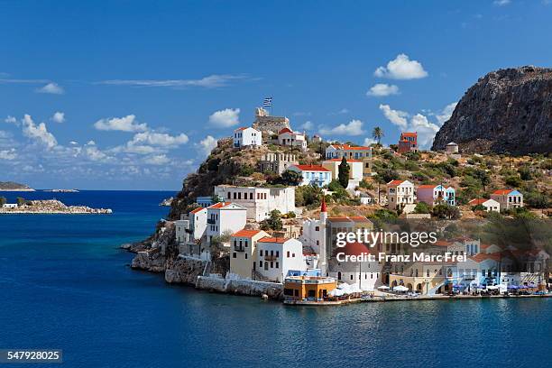 port entrance, kastelorizo megiste - greece war stock-fotos und bilder