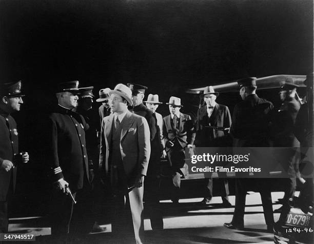 American actor Jack Oakie , as 'Cyclone' Case, in a publicity still for A. Edward Sutherland's 1931 comedy, 'The Gang Buster'.