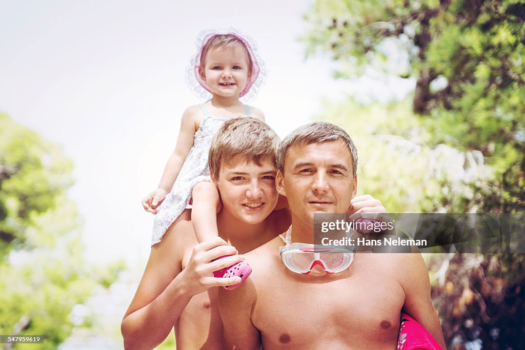 Portrait of father with kids