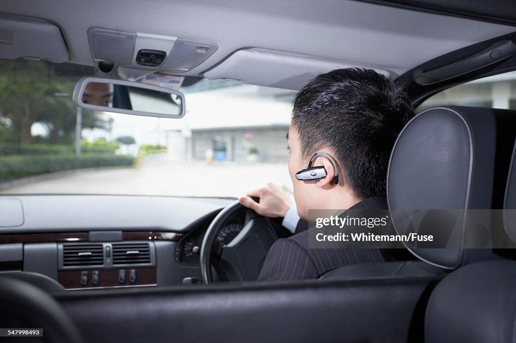 Businessman Driving Car