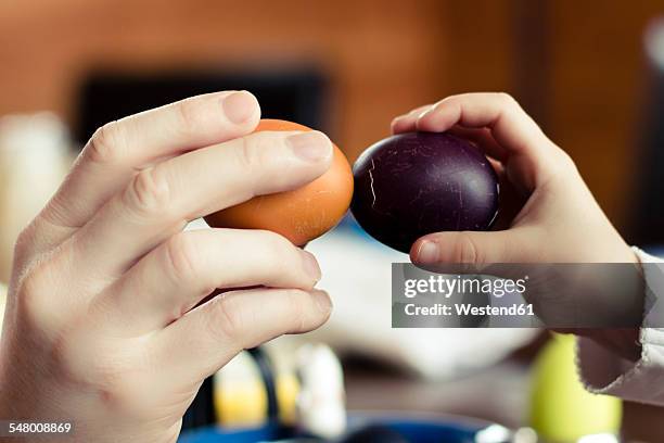 egg tapping - kid boiled egg stock pictures, royalty-free photos & images