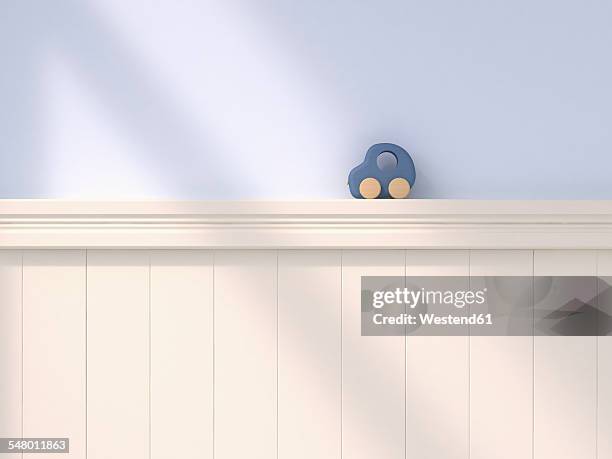 wooden toy car standing on wall cladding, 3d rendering - cladding stock illustrations
