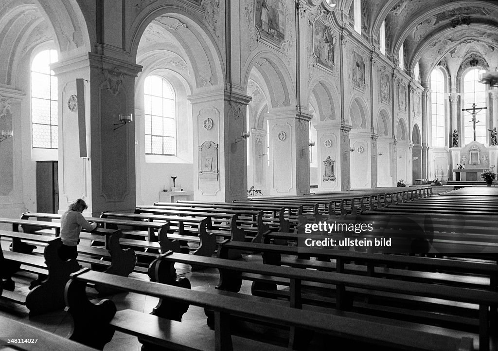 Religion, Christianity, young woman kneels in a pew and prays, aged 30 to 35 years, Elisabeth - 15.09.1981