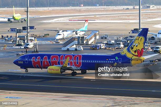 Germany - Hesse - Frankfurt am Main: Tui Fly Boeing B737-800 with HARIBO advertising at Frankfurt airport